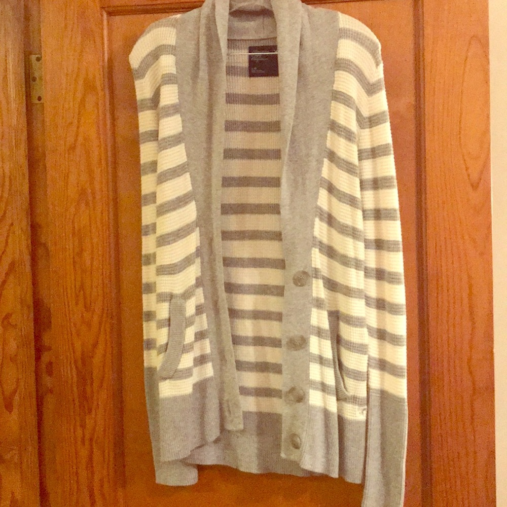 Waffle knit long sleeve cardigan.